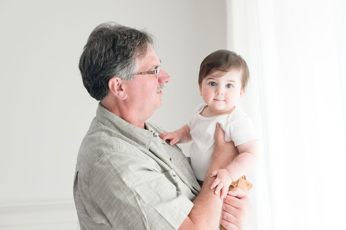 grandfather and grandson together in studio