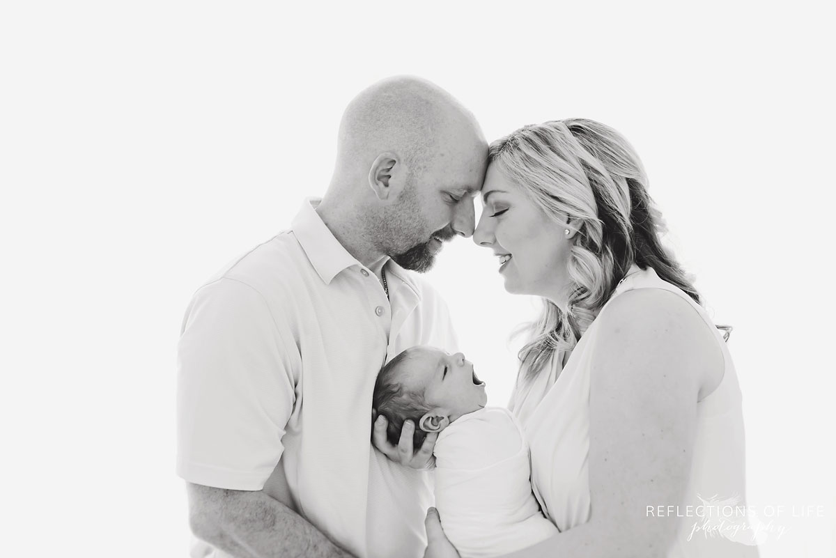 black and white family portrait in studio