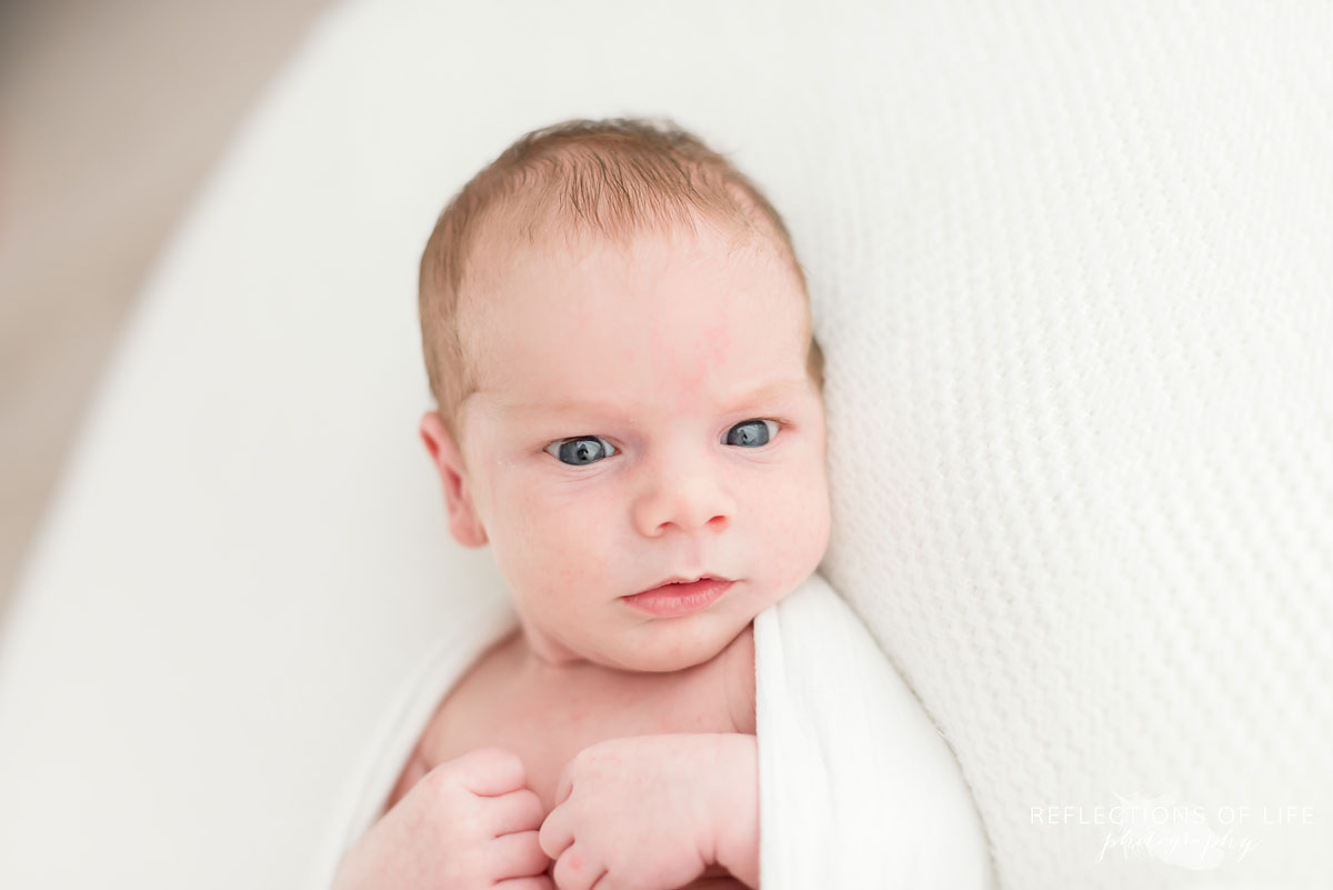 portrait of baby boy's face in studio