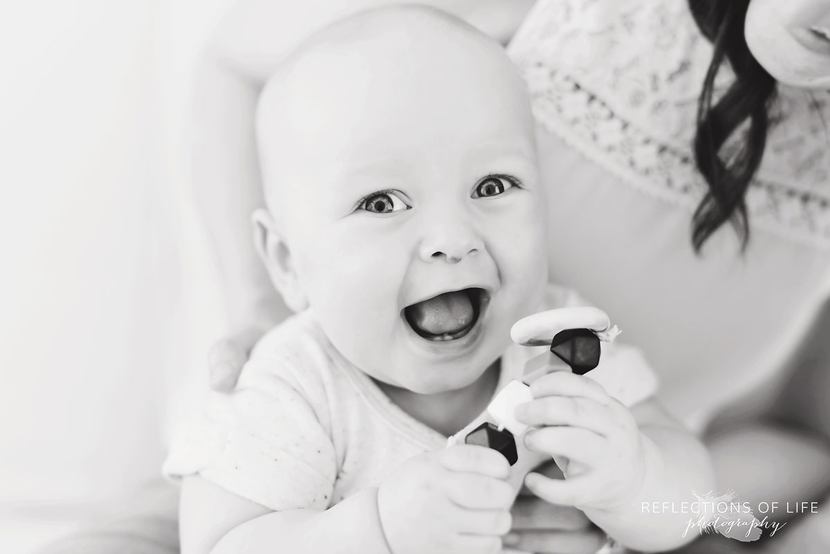 portrait of happy baby black and white.jpg