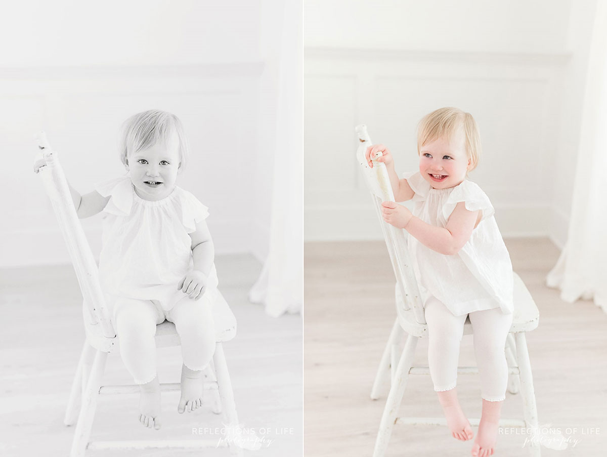 litle girl posing on a white chair in niagara ontario photo studio