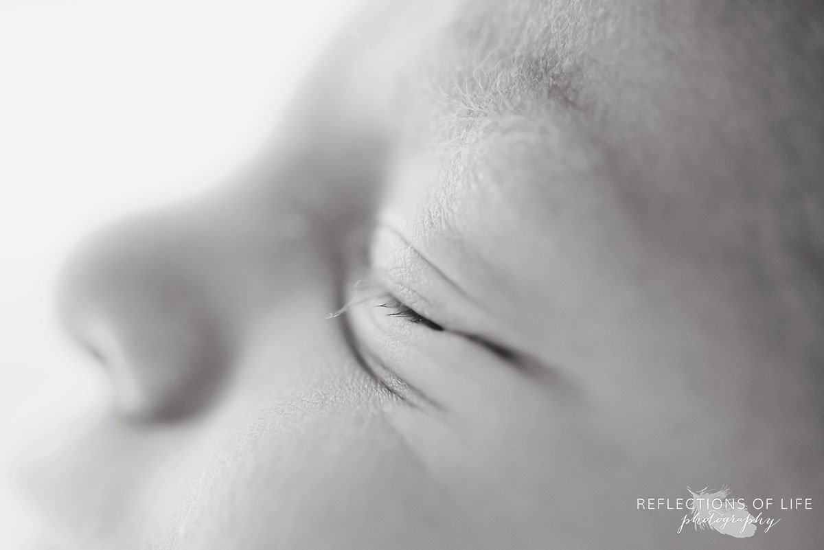 close up of newborn baby boy eyelashes