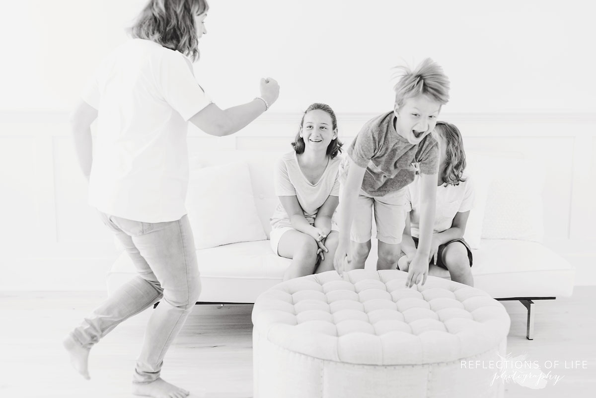 Action photography of kids playing with their mama.jpg