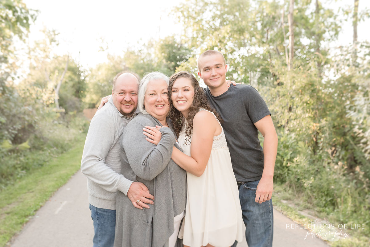 Family photo of four in nature walk in Grimsby