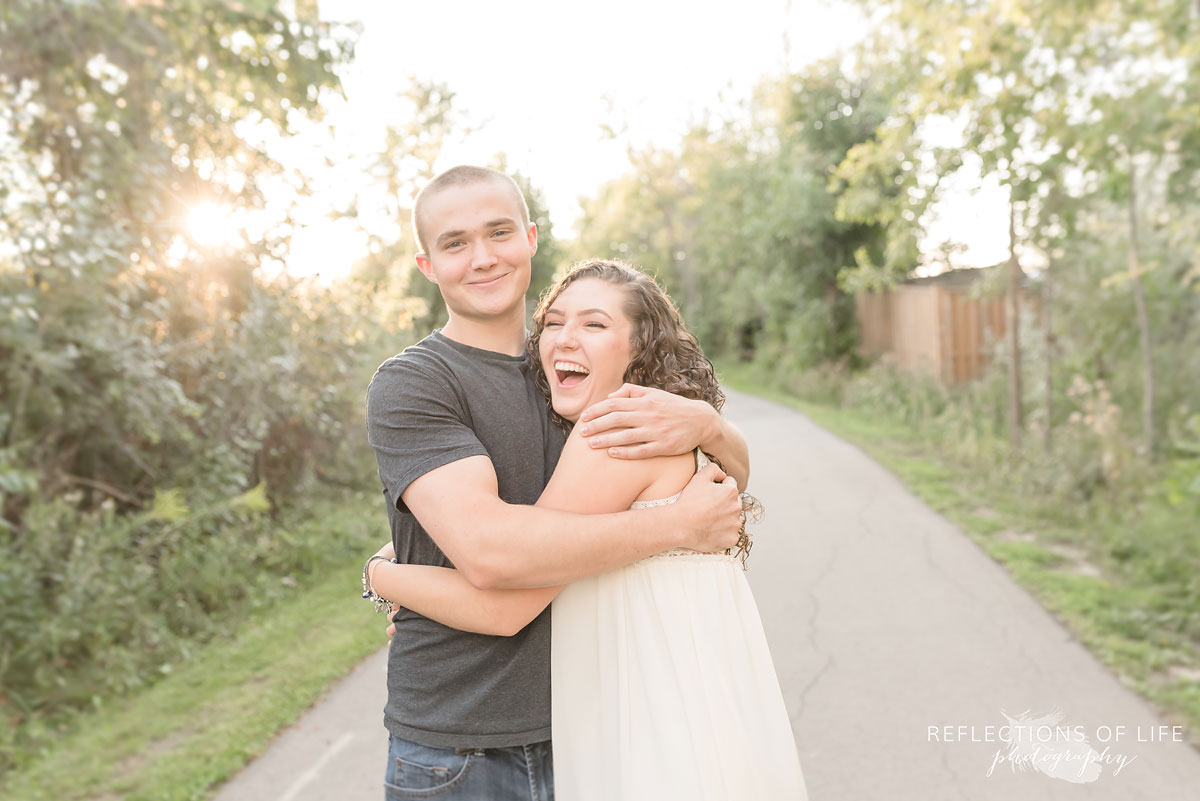 Girlfriend and boyfriend hugging on nature hike in Grimsby