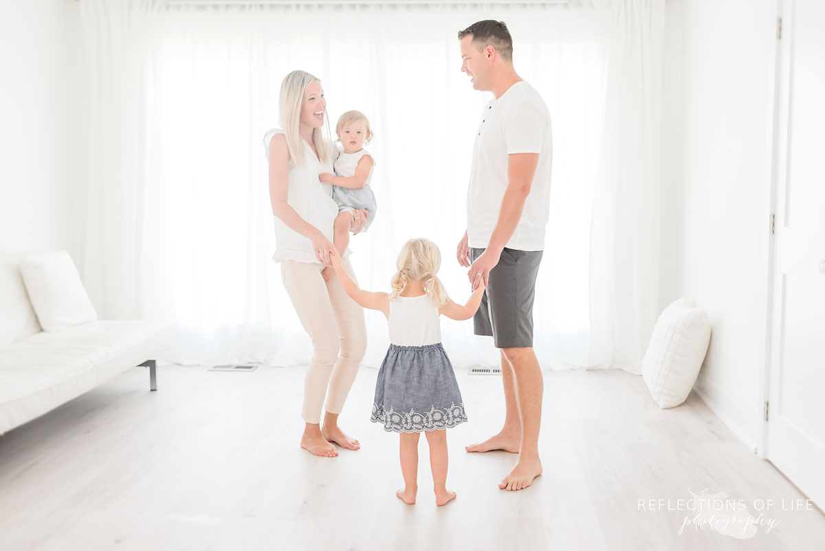 family of four in white studio Niagara Region