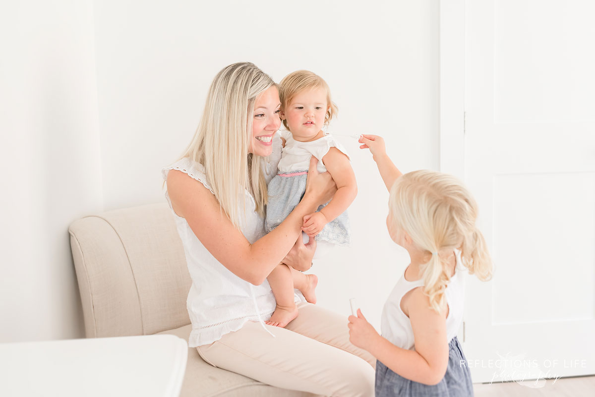 mother and daughter playing in Karen Bykers studio