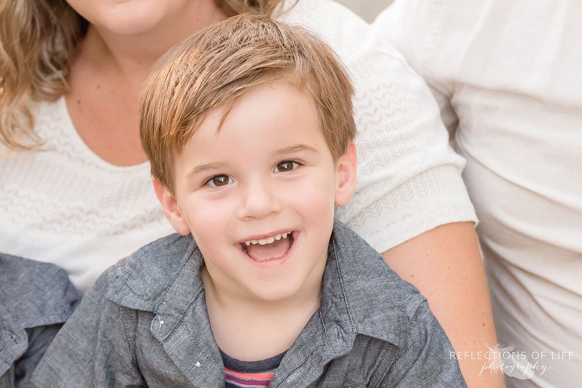 Happy smiling boy photographed by Karen Byker