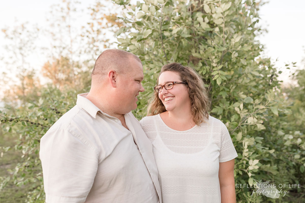 happy mother and father laughing in Grimsby Ontario