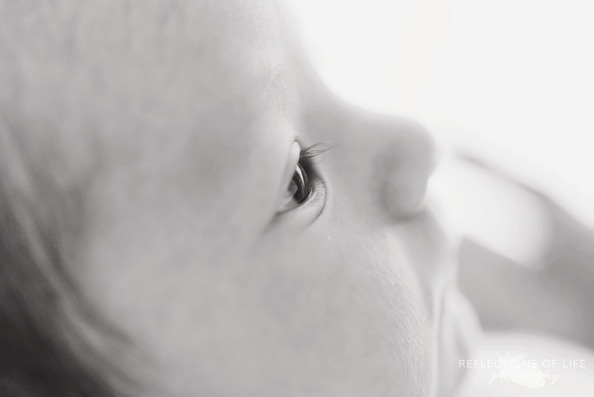 close up photo of the side of a babies face