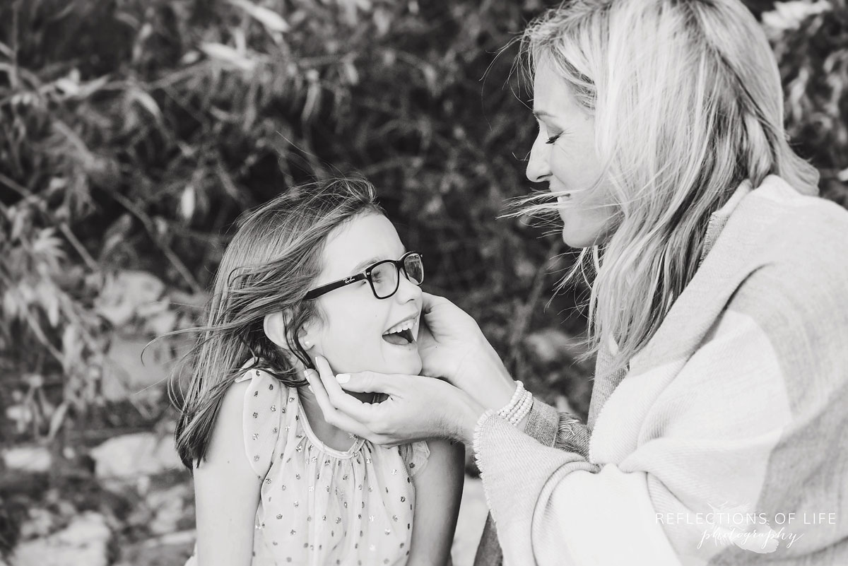 mother smiling at daughter