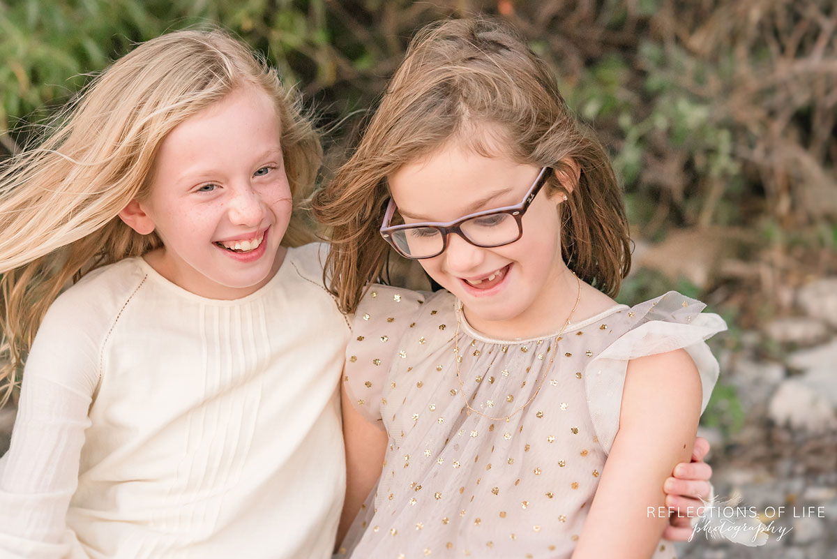sisters laughing