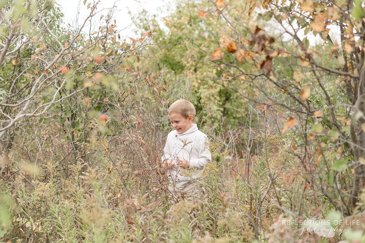 022 little boy exploring nature