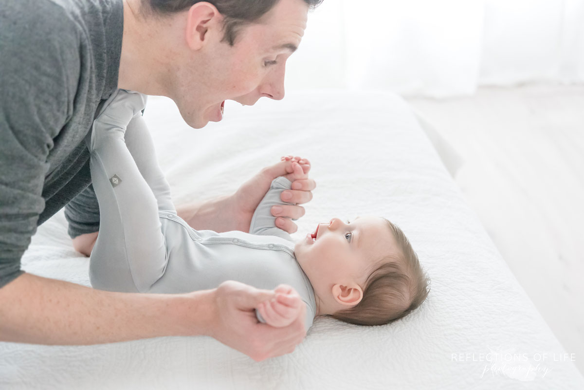 father and baby with open mouth