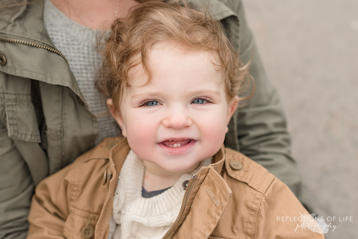 portrait of toddler smiling at camera