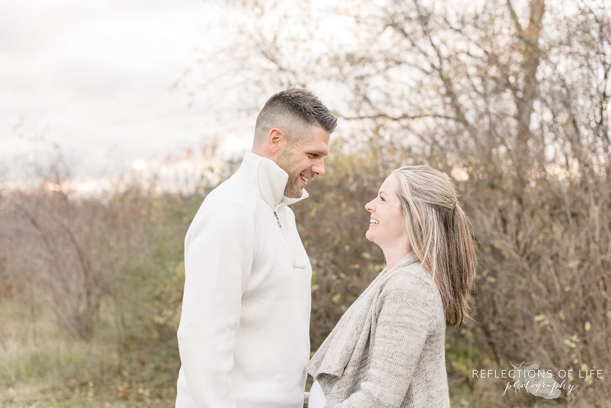 husband and wife laughing together in grimsby ontario