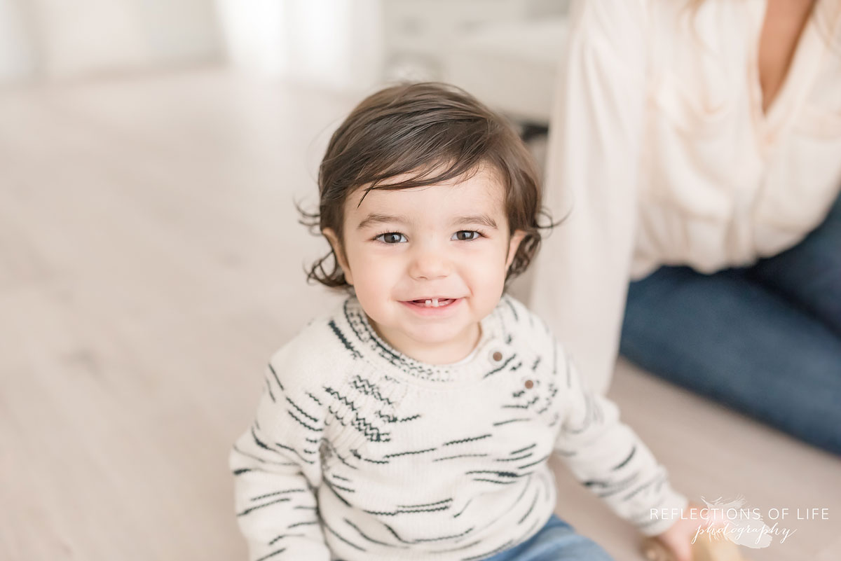 little boy smiling at camera