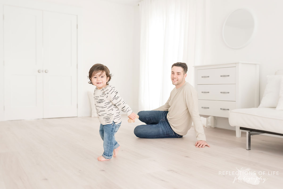toddler running around studio