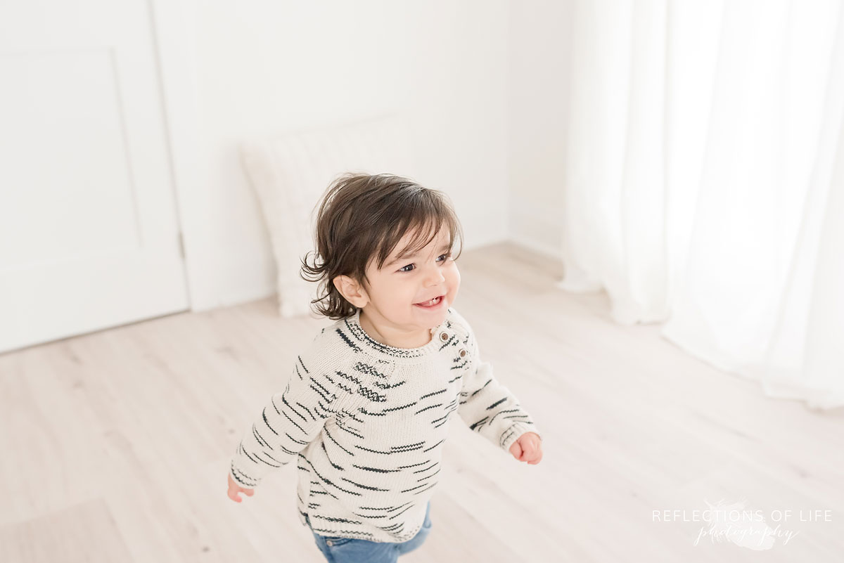 little one runing around studio niagara region