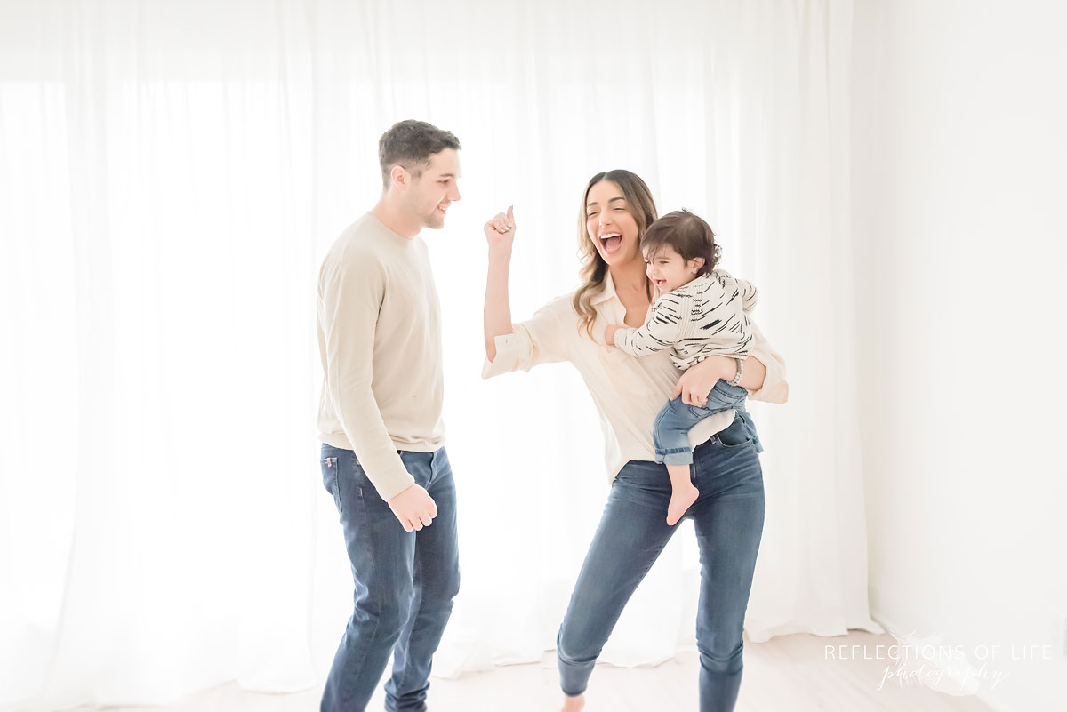 family dancing in studio