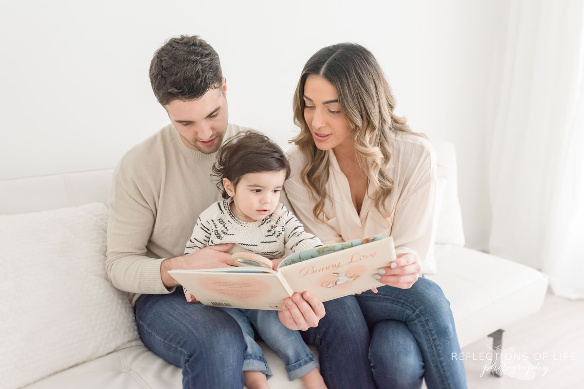 family reading a book