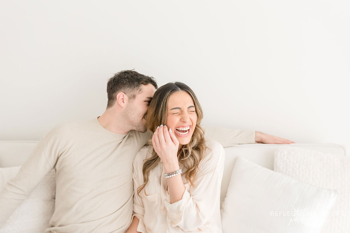 wife laughing at husband