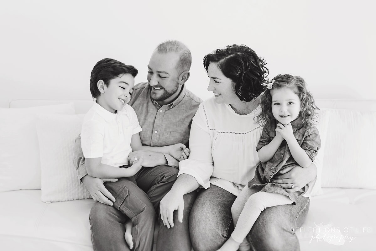 Familiy on white couch
