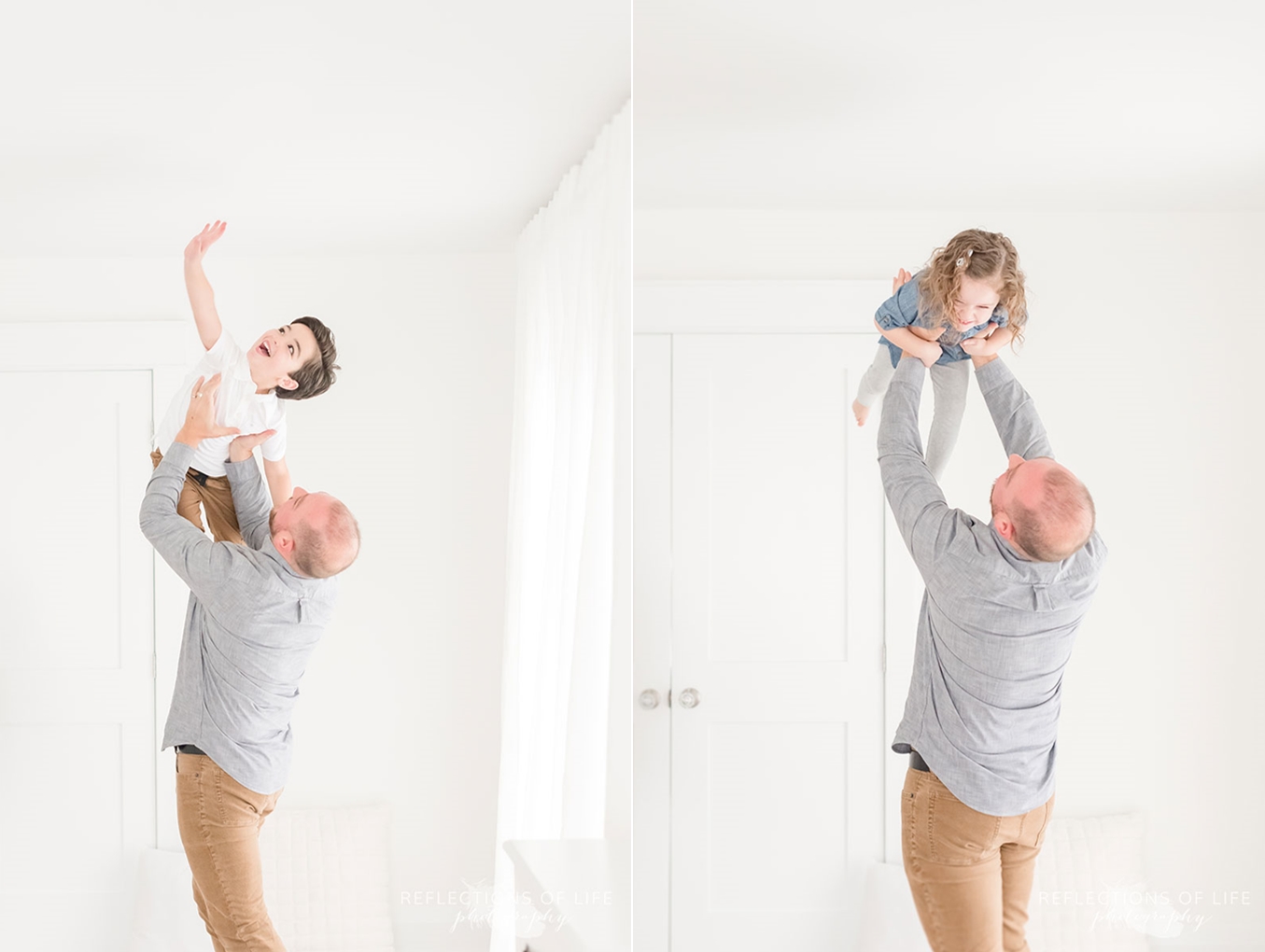 father holding up children