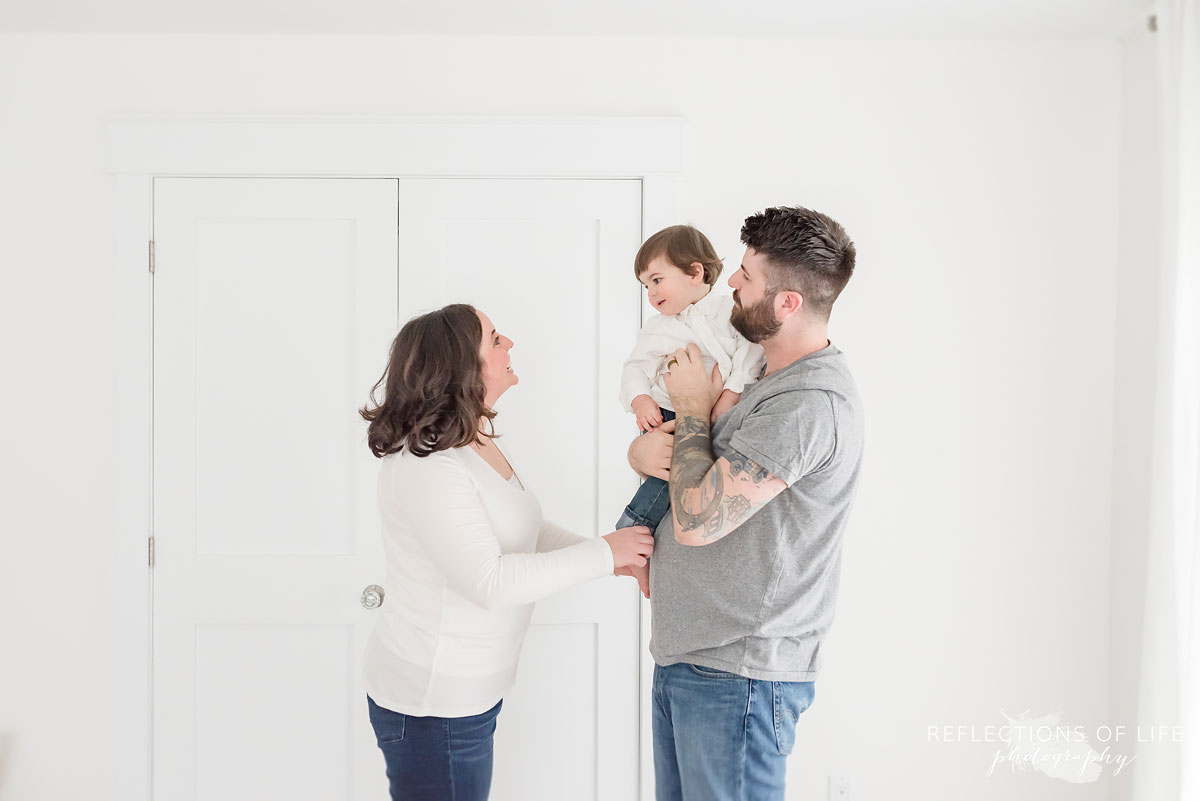 Family in white studio