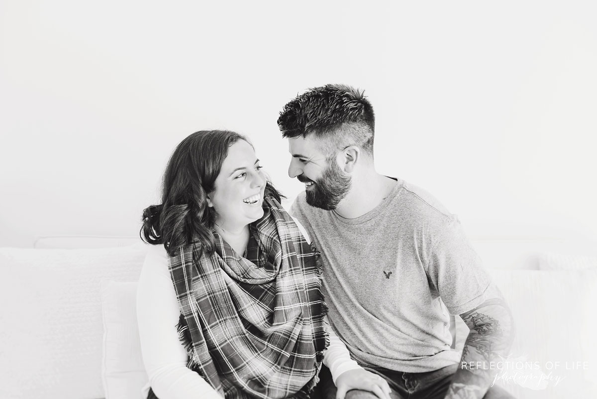 Husband and wife laughing