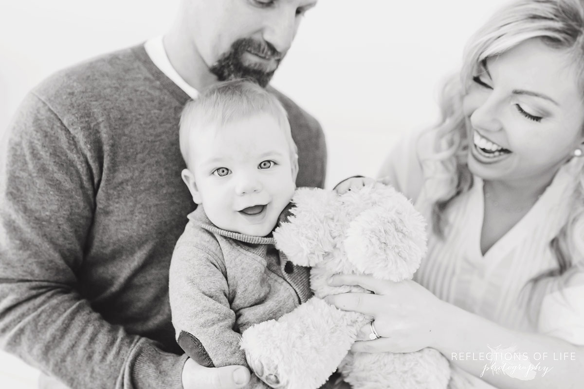 Copy of Copy of Adorable little boy with his stuffed puppy dog n back and white