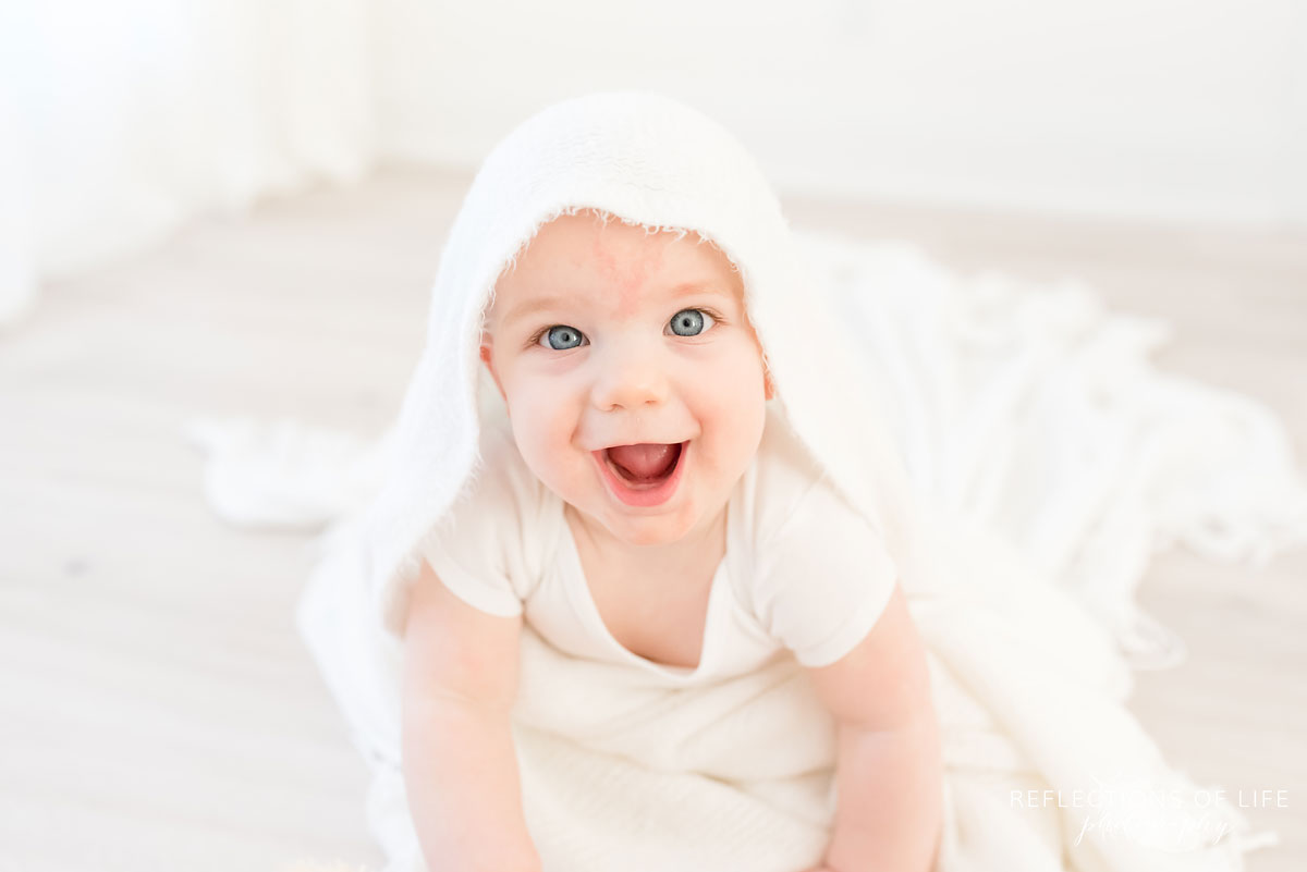 Copy of Copy of Baby boy photography in white studio with soft blankets
