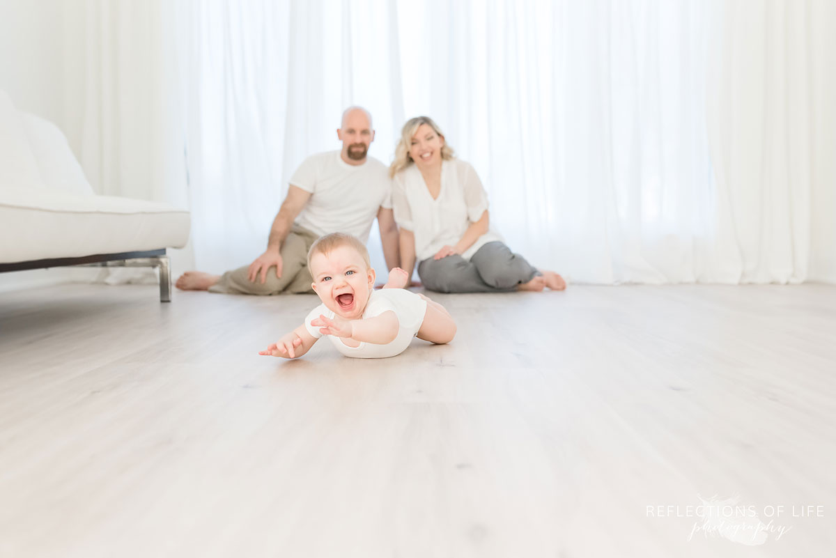 Copy of Copy of Very excited and laughing baby boy learns to crawl