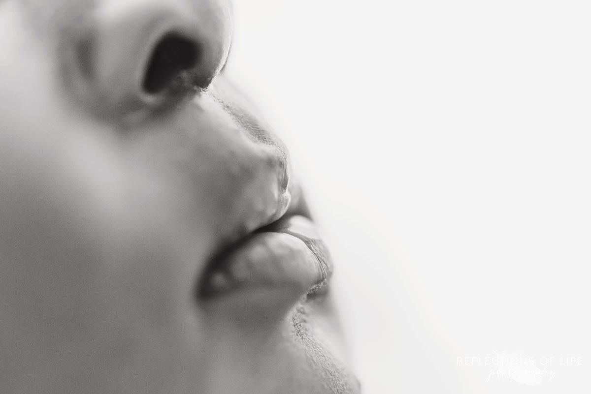 Macro lens photography of newborn baby lips