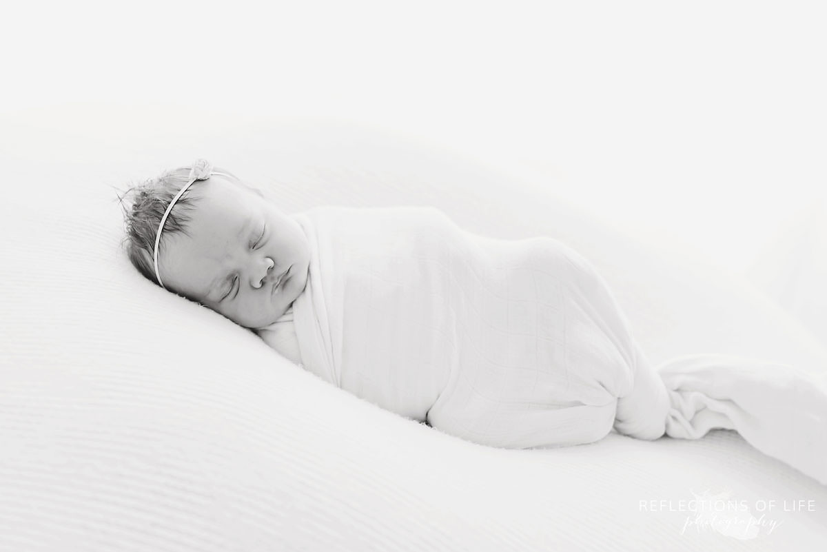 Cute baby sleeps black and white