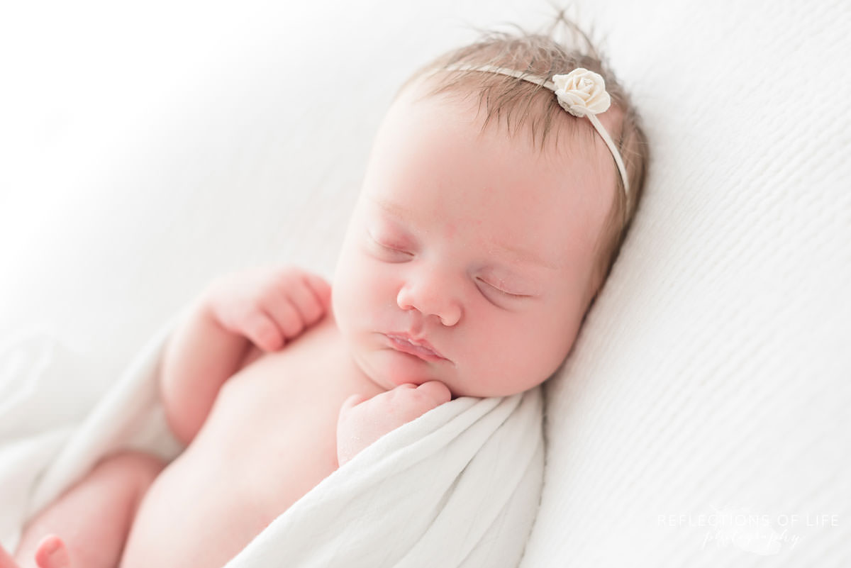 Close up of cute baby in natural light studio