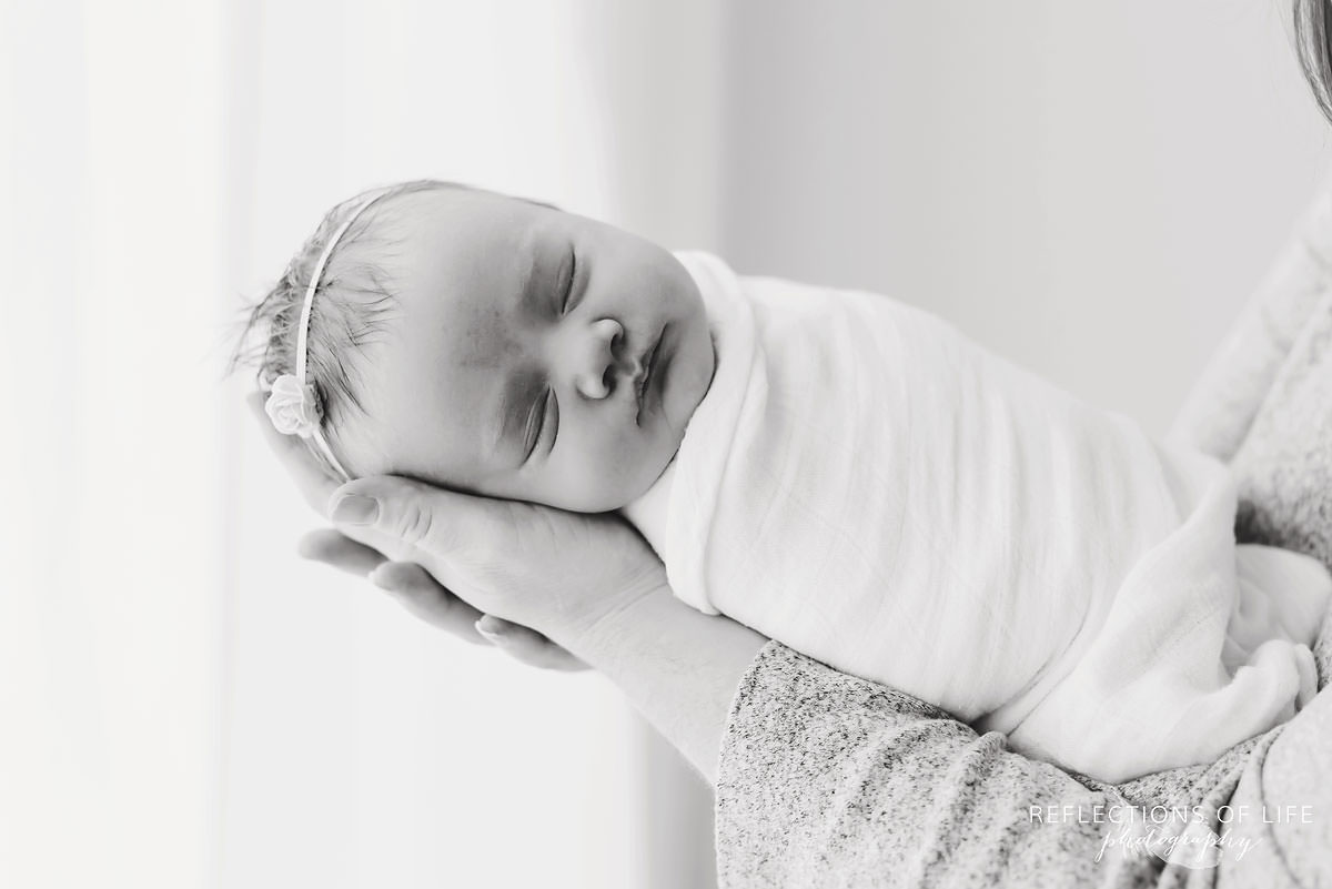 sleeping newborn closeup black and white 