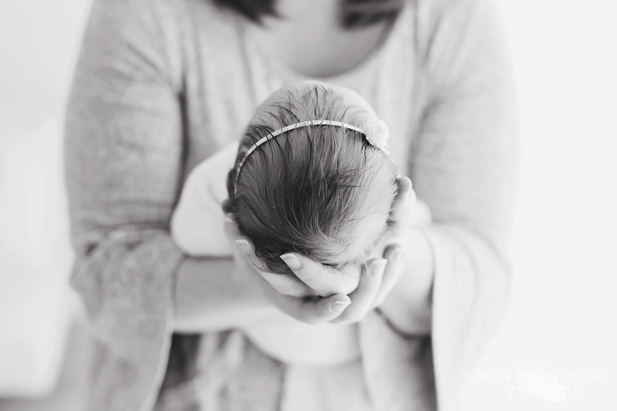 newborn baby's head close up black and white in Niagara