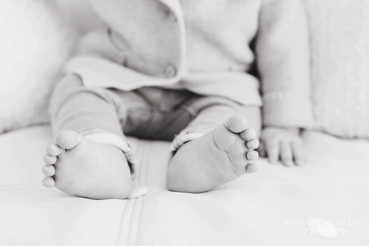 black and white of baby's cute feet