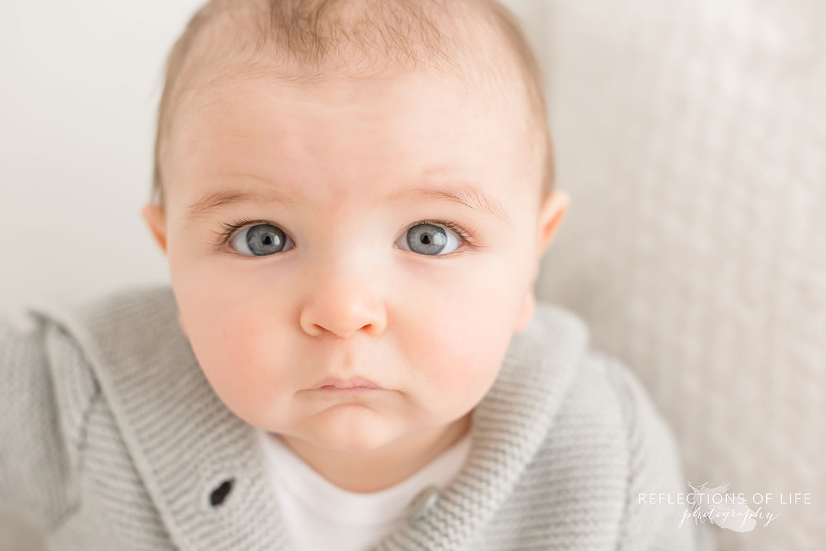 close up of cute baby in natural light studio