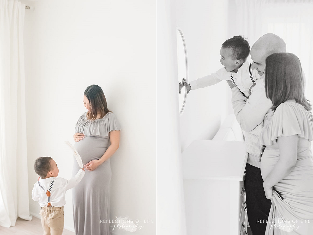 two photos of little boy showing his mother a feather and family of three looking into a mirror in black and white