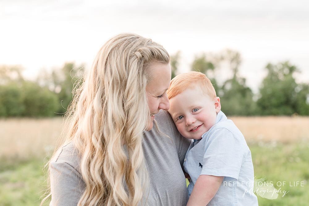 Little boy in mamas arms Niagara Ontario Photographer