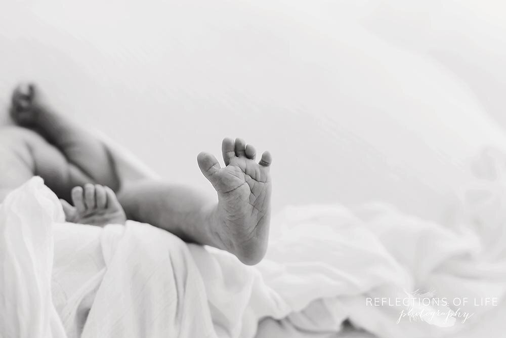 Newborn baby toes candid.jpg