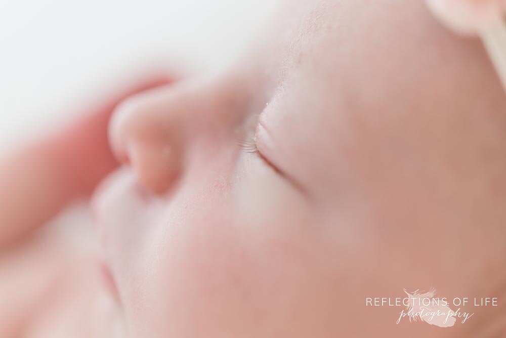 Little tiny newborn eyelashes and side profile