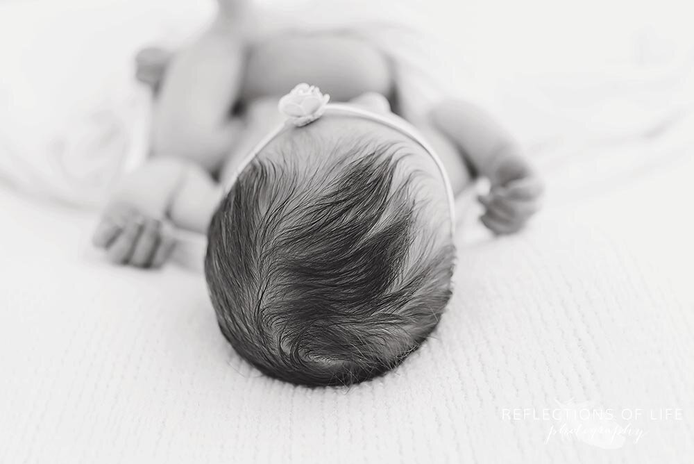 Newborn baby hair in black and white