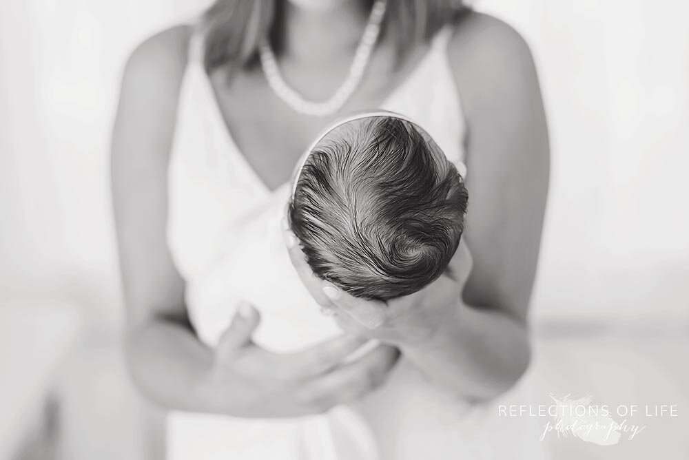 Newborn baby girl head of hair