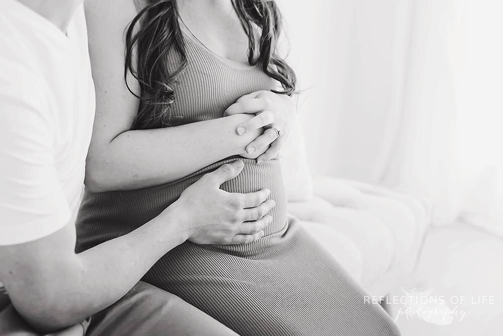 Close Up Of Couple Holding Pregnant Belly Hamilton Ontario