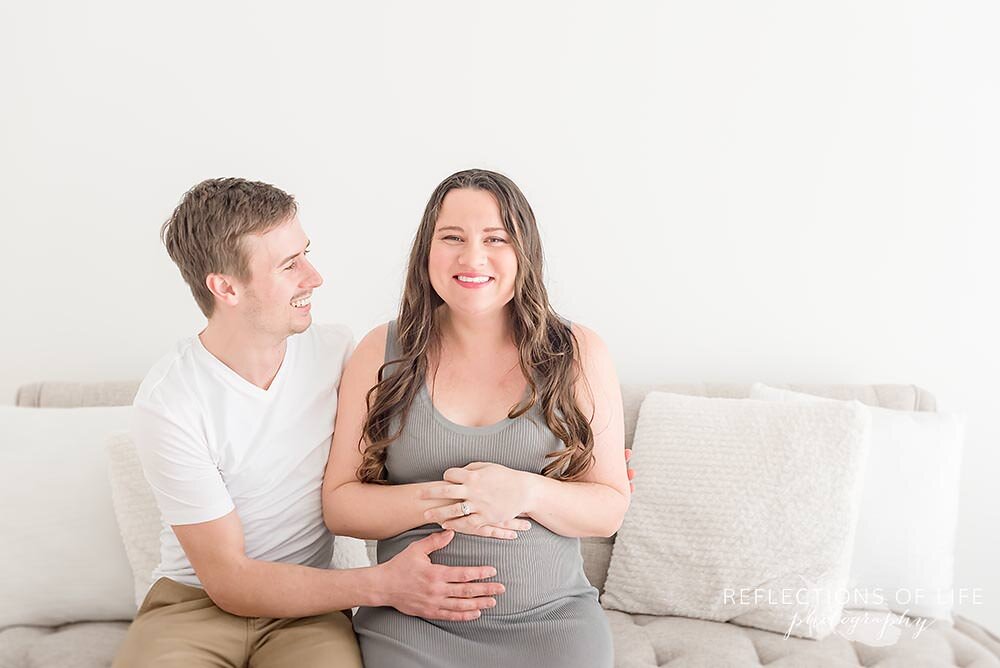 Husband Feeling Wife's Pregnant Belly Burlington Ontario