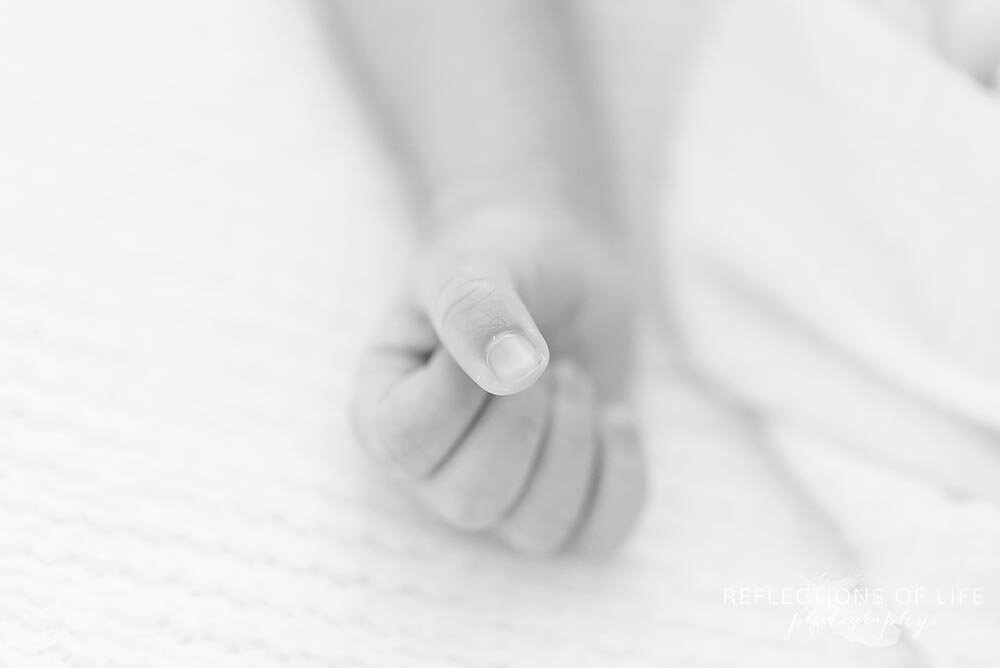 Newborn baby boy hand with fist tightly clenced Grimsby Ontario
