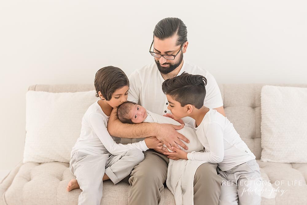 Fatherhood photos with three young boys